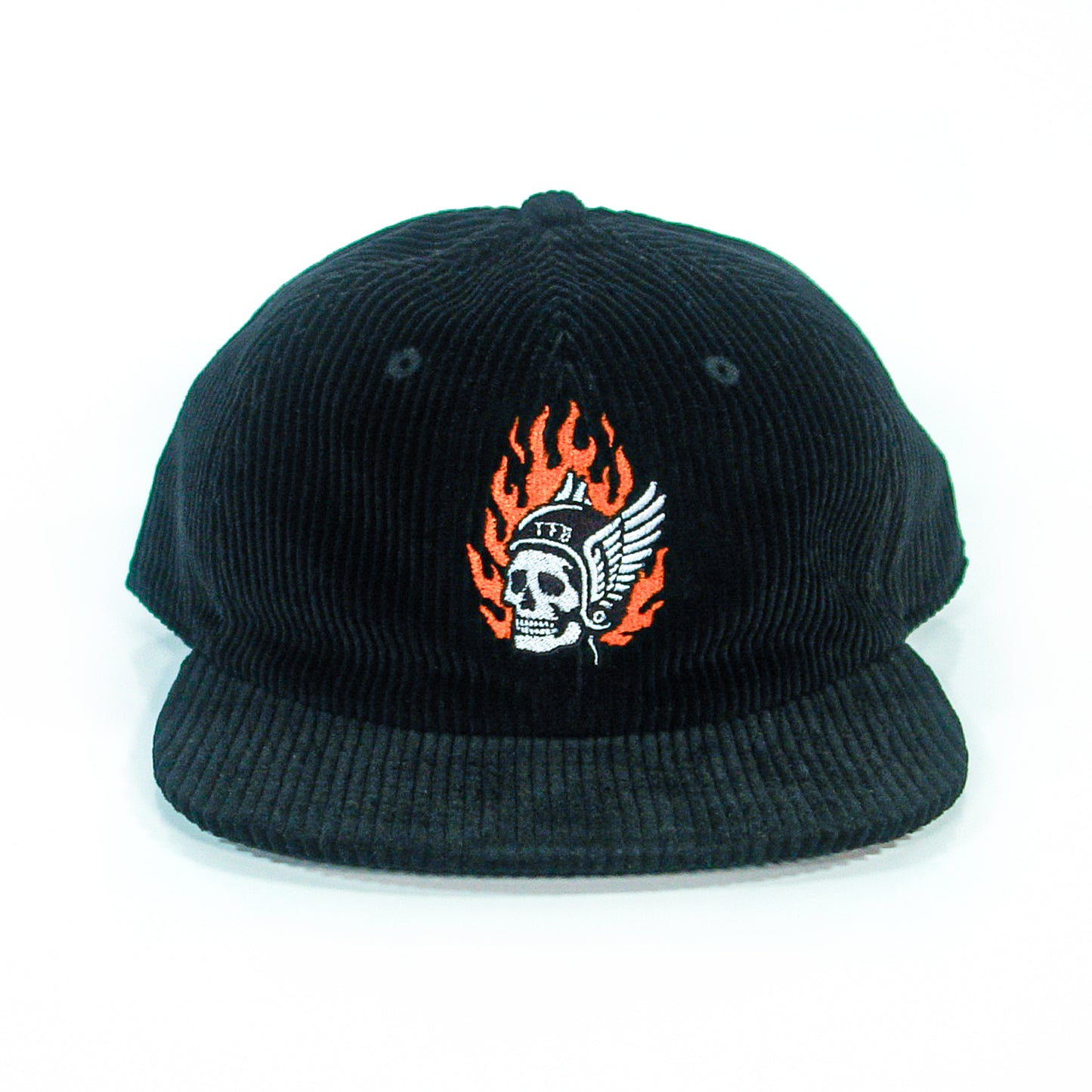 A black corduroy baseball cap from The Front Bottoms, featuring a flaming skull in a winged helmet and "1776" embroidered on the front, shown head-on against a white background. Ideal for fans of bold embroidered hats.