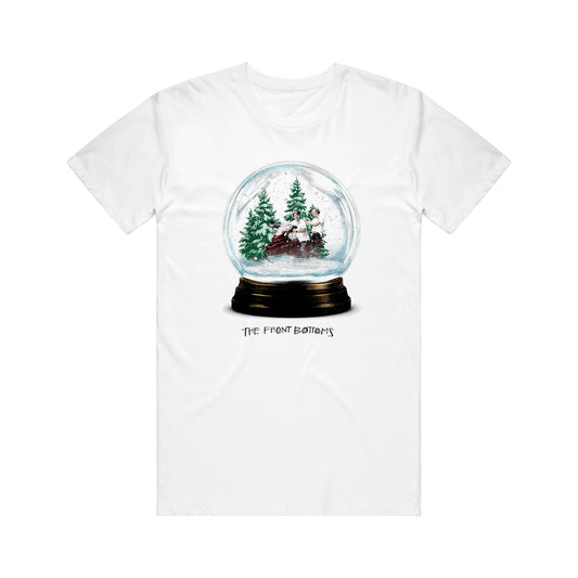 White Gildan Hammer t-shirt from The Front Bottoms featuring a snow globe illustration with pine trees and a cabin; "The Front Bottoms" is printed below the design, making it a standout printed tee.