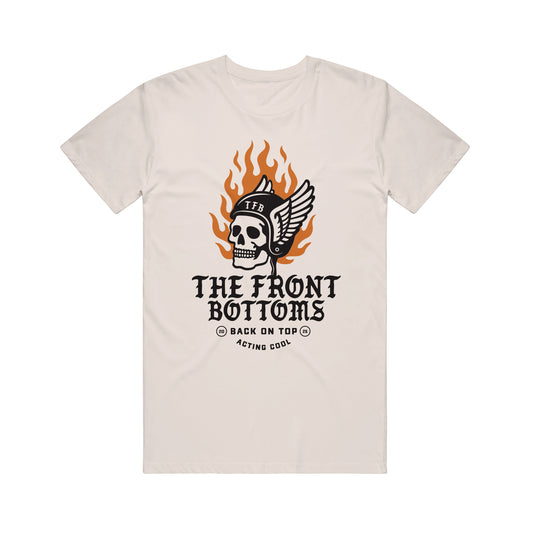 A beige Gildan Heavy Cotton T-shirt with a helmeted skull, “TFB,” flames, and wings. Below: bold "The Front Bottoms" and small text “Back on Top” & “Acting Cool.” Brand: The Front Bottoms.